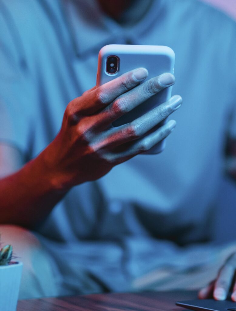 person holding their phone